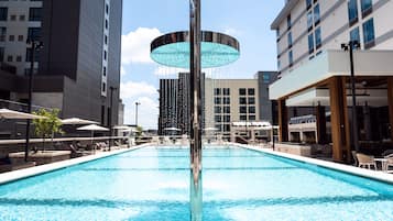 Outdoor pool, open 6:00 AM to 10:00 PM, pool cabanas (surcharge)