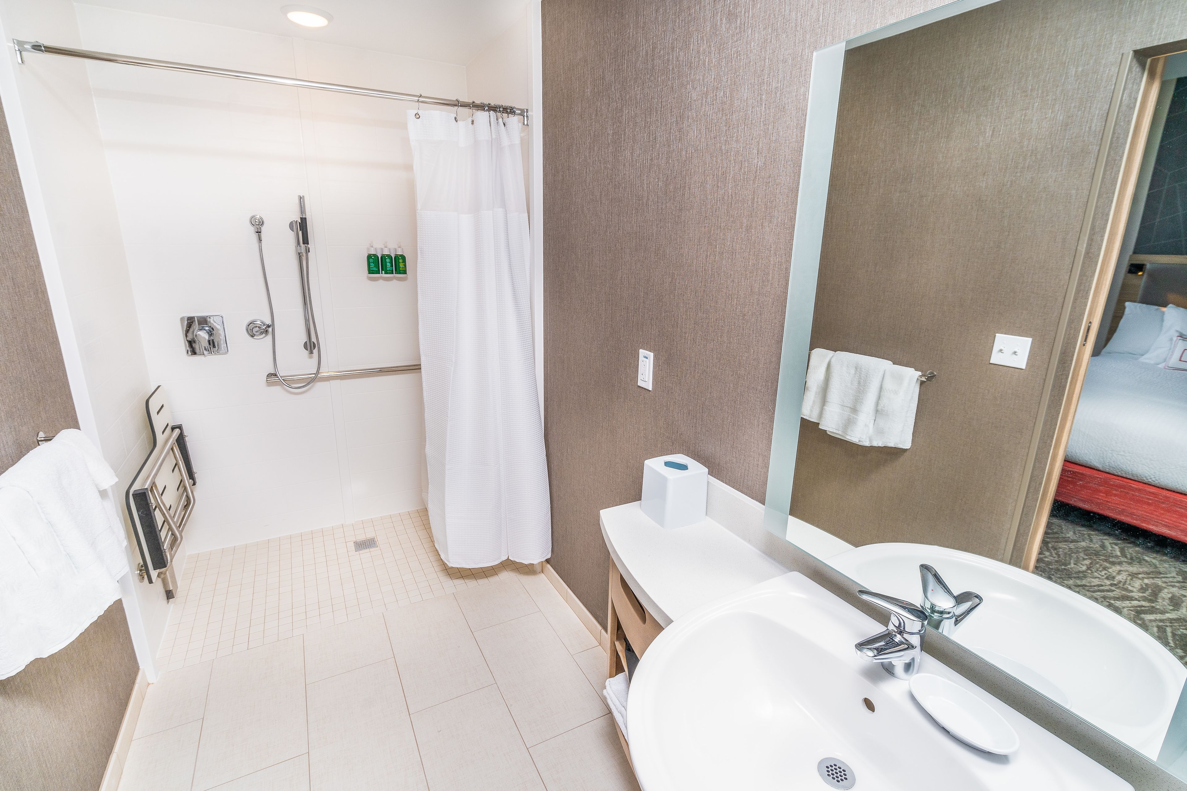 shower, free toiletries, hair dryer, towels