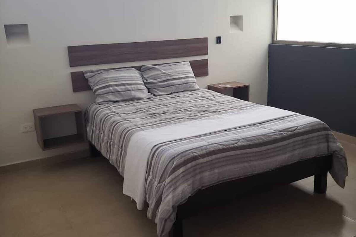Apartment, 2 bedrooms (Depto 10) | Escrivaninha, ferros/tábuas de passar roupa, Wi-Fi de cortesia