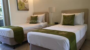 Oasis 4 At Palm Cove | 3 bedrooms, premium bedding, in-room safe, desk