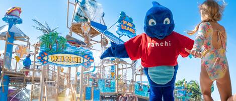 A water park with a mascot, a slide, and a sign that reads "Welcome".