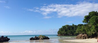 Chic and modern condo steps away from dream-like white sand beach