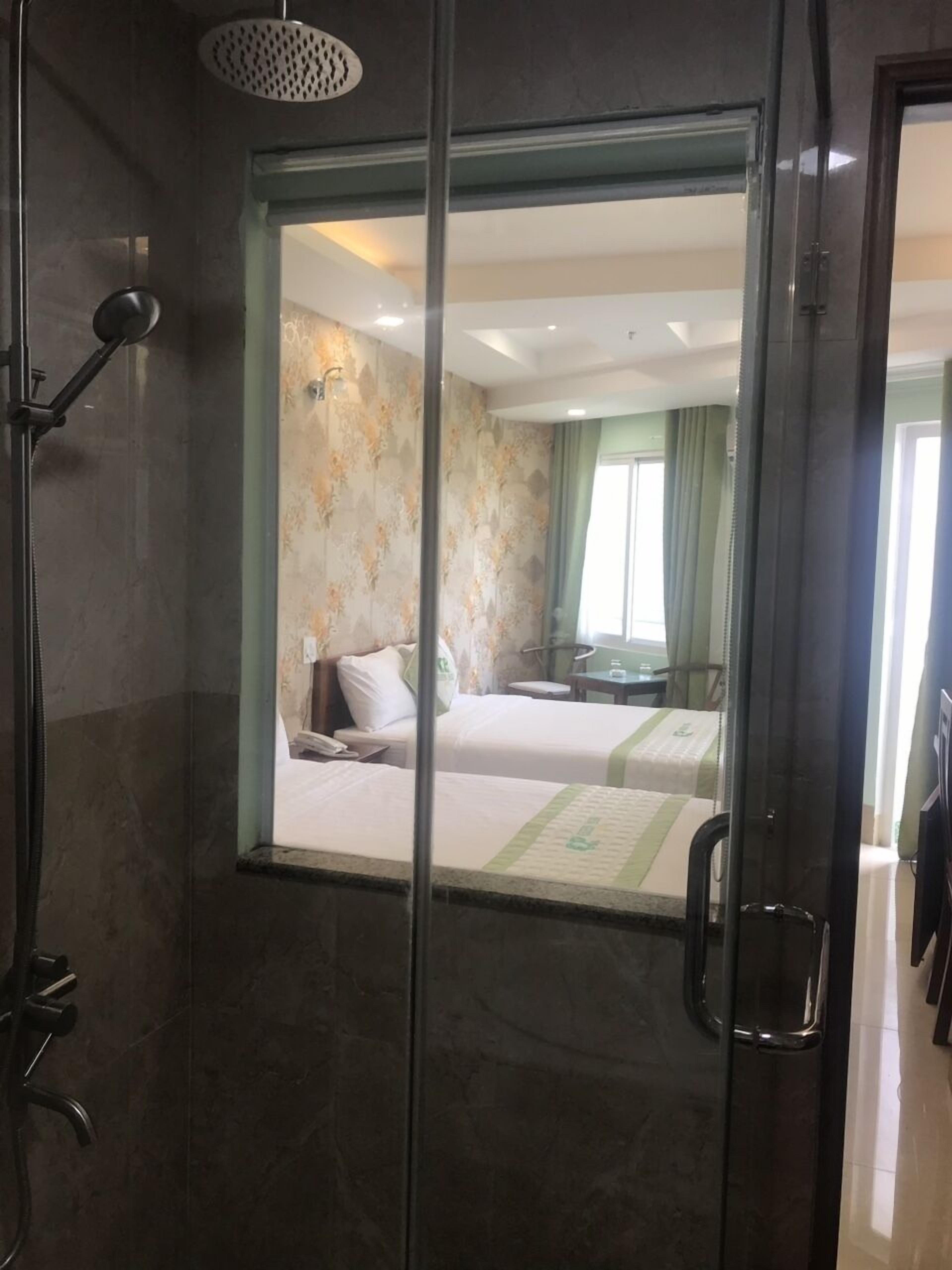 Deluxe Quadruple Room, 2 Double Beds, Park View | Bathroom | Shower, hydromassage showerhead, slippers