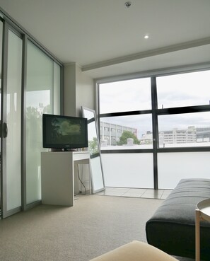 Apartment, 1 Queen Bed with Sofa bed, Garden View | Living area