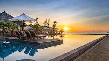 Outdoor pool, pool umbrellas, pool loungers