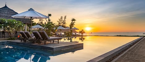 Outdoor pool, pool umbrellas, pool loungers