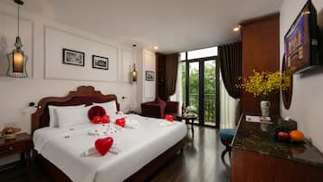 Suite junior, balcón, vistas a la ciudad | Sábanas de algodón egipcio y ropa de cama de alta calidad