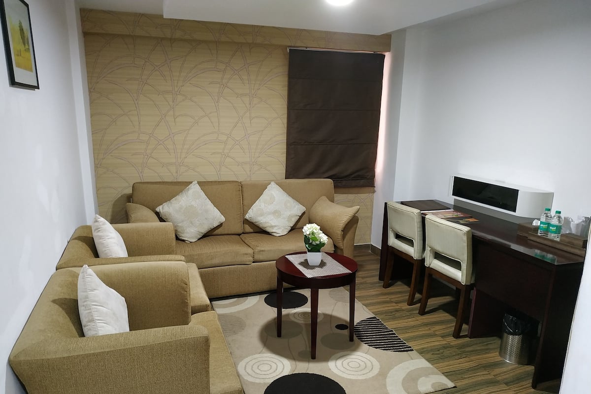 elite deluxe room | premium bedding, in-room safe, desk, soundproofing