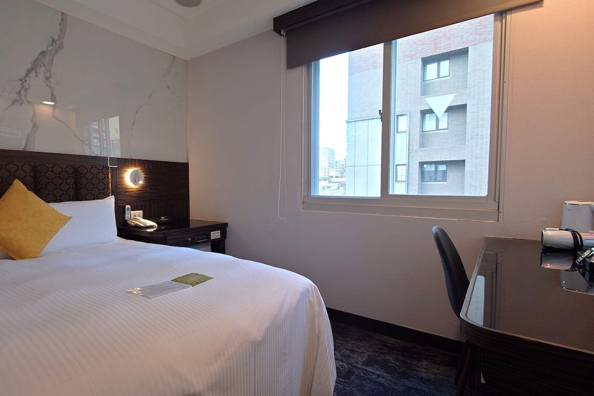 Desk, blackout drapes, iron/ironing board, free WiFi
