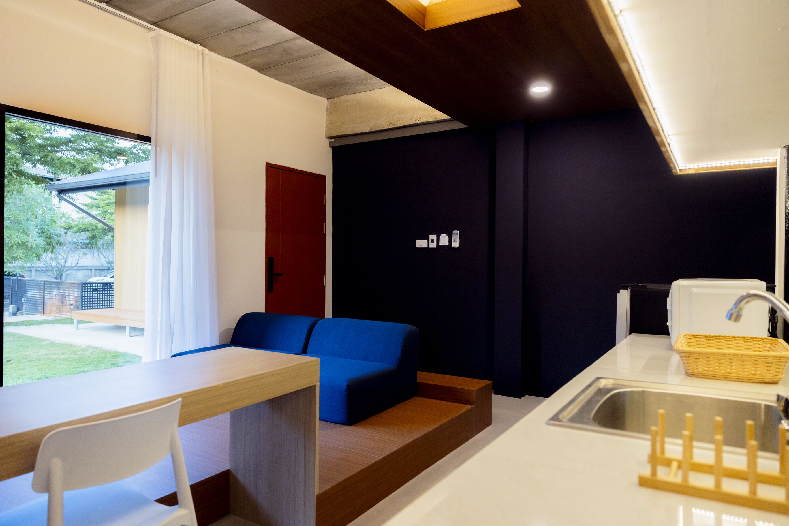 family room with bunk bed | living area | flat-screen tv