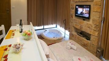 Deluxe Suite, 1 King Bed (with pool) | Living area | Flat-screen TV