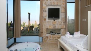 Deluxe Suite, 1 King Bed (with pool) | Living area - Ahuzat Kaplan (Mevoot HaHermon)