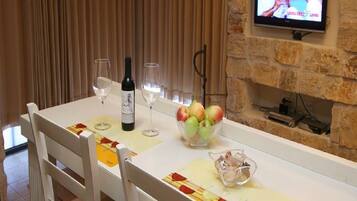 Deluxe Suite, 1 King Bed (with pool) | Living area | Flat-screen TV