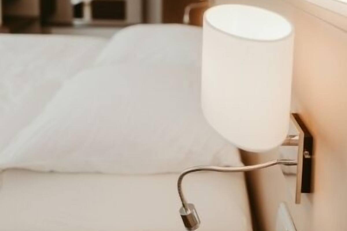 business quadruple room, 1 king bed with sofa bed, non smoking | hypo-allergenic bedding, down duvets, desk, laptop workspace