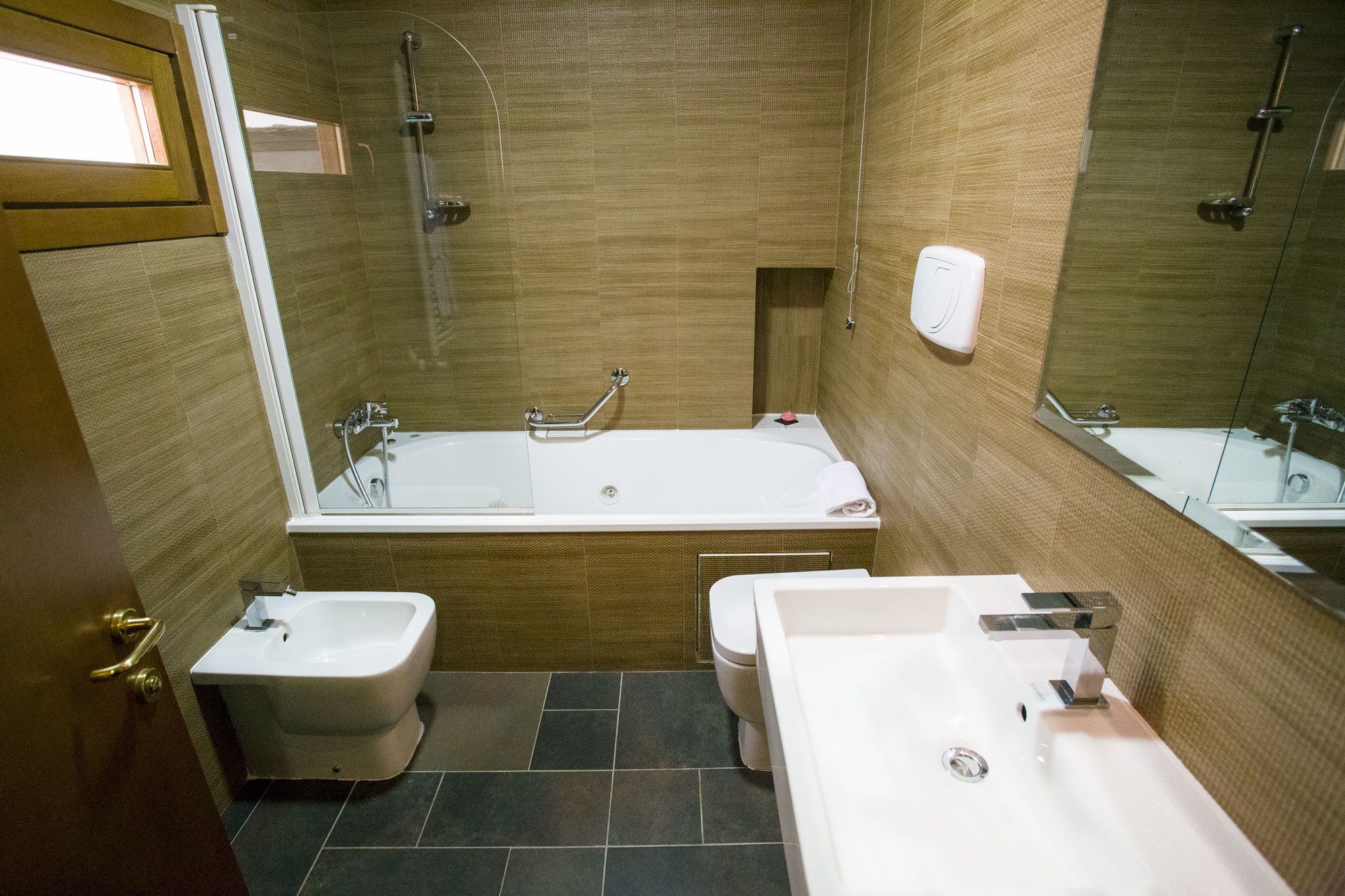 superior double room | bathroom | rainfall showerhead, free toiletries, hair dryer, slippers