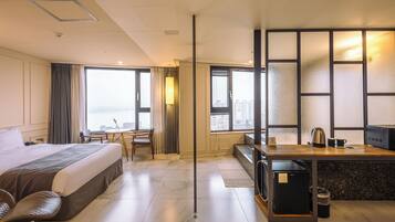 Deluxe Double Room, River View | Premium bedding, down comforters, in-room safe, individually decorated