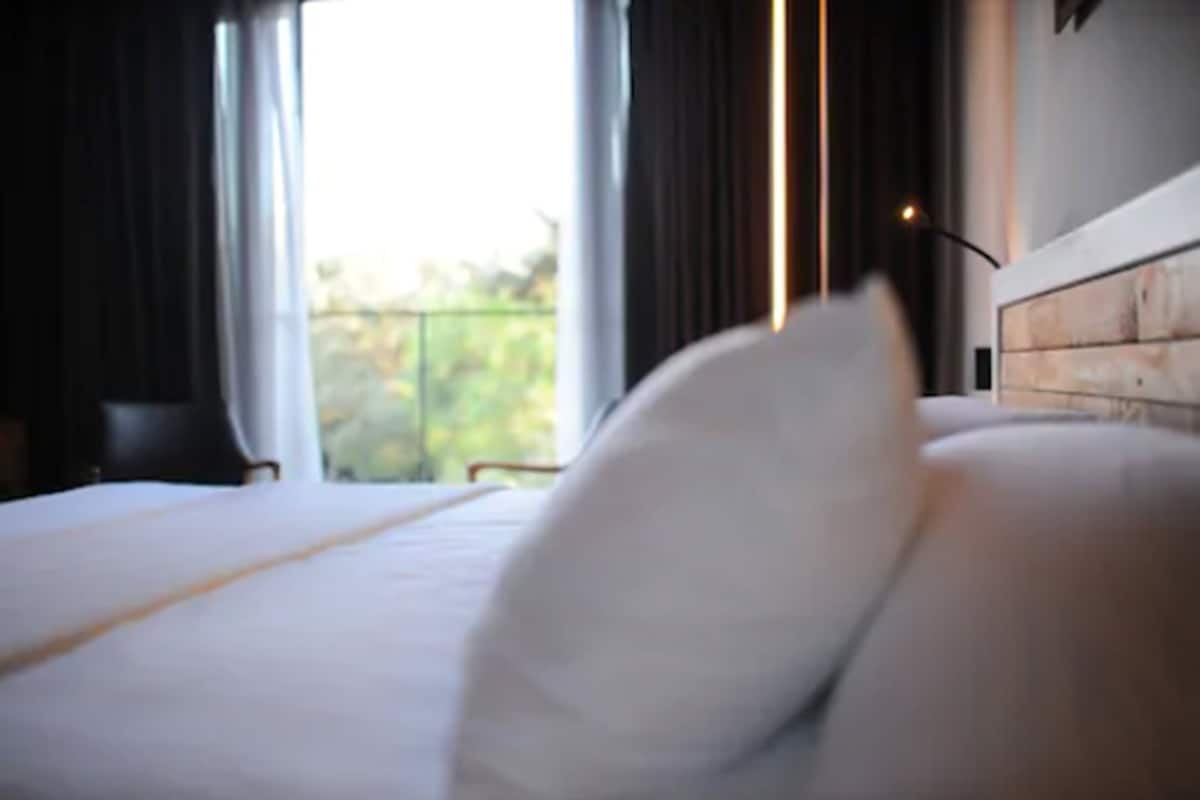 Serenity Suite | Premium bedding, minibar, in-room safe, desk