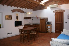 Ferienhaus, Kamin, Parkblick | Wohnzimmer | Flachbildfernseher, Kamin