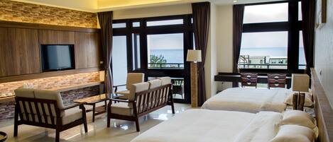 Deluxe Quadruple Room, Sea View | Desk, blackout drapes, free WiFi