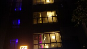 A hotel named "The Heaven" with a prominent sign, multiple windows, and a visible entrance. - Sky Stays Heaven (Dwarka)
