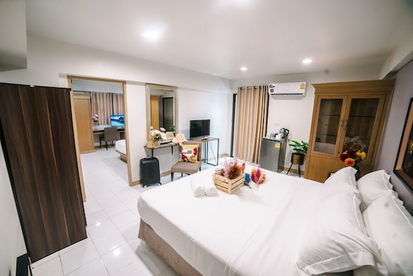 Habitación familiar | Artículos del minibar gratis, wifi gratis y ropa de cama