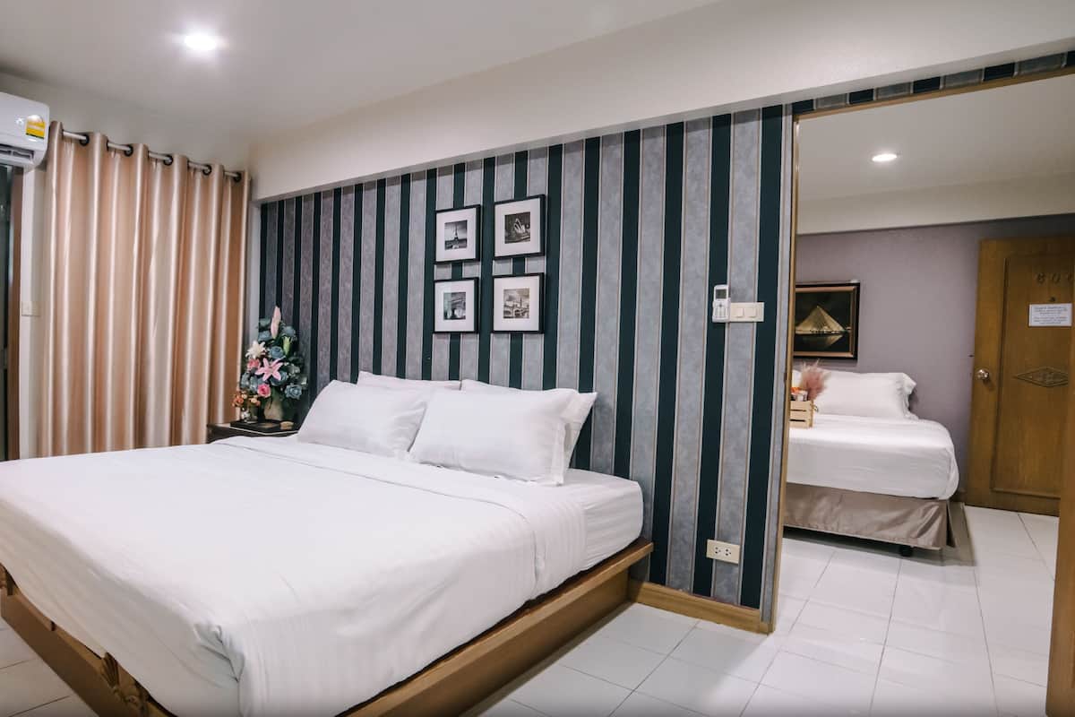 Standard Quadruple Room | Minibar (free items), WiFi (free), bed sheets
