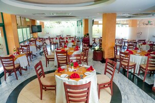 Breakfast and dinner served, local and international cuisine