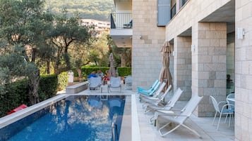 Seasonal outdoor pool, pool umbrellas, sun loungers