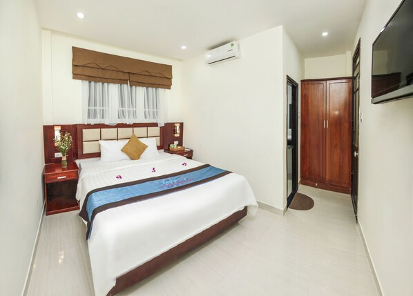 Apartamento superior | 1 quarto, cofres nos quartos, escrivaninha, Wi-Fi de cortesia