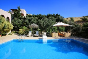 Outdoor pool, pool umbrellas, pool loungers