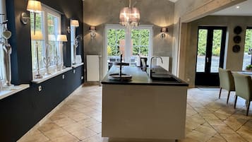 Deluxe Apartment, 2 Bedrooms, Non Smoking, Fireplace | Private kitchen | Espresso maker, electric kettle