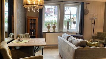 Design Apartment, 1 Double Bed, Balcony | Living area | 30-inch LCD TV with satellite channels, TV