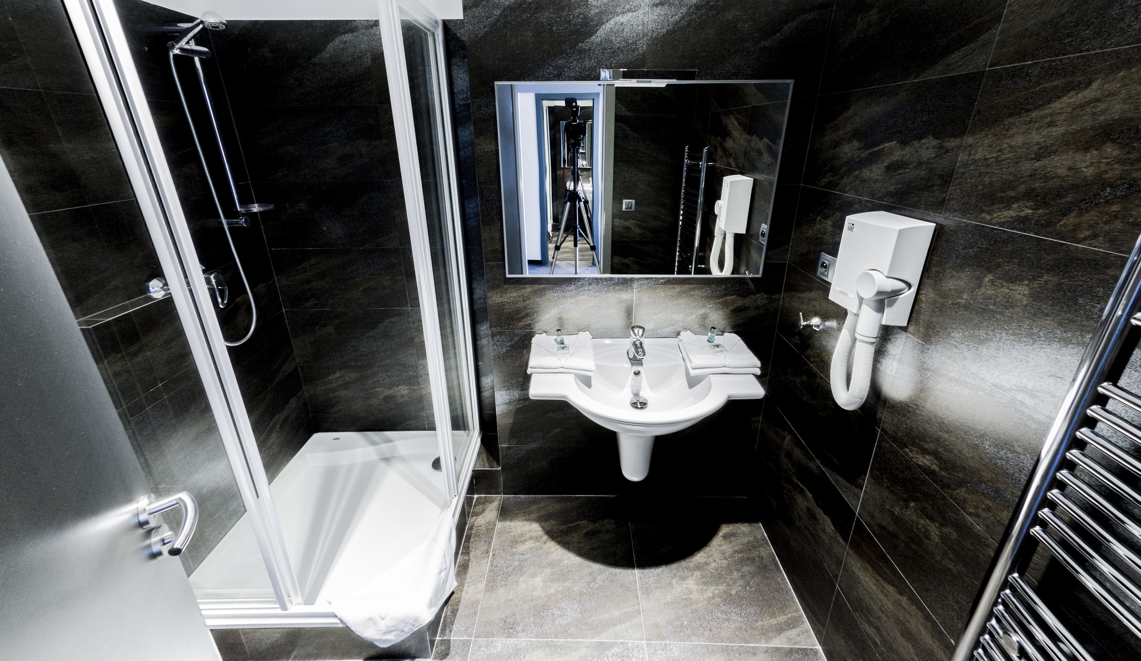 shower, free toiletries, hair dryer, towels