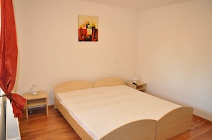 Habitación clásica | Cunas gratuitas, camas extra y ropa de cama