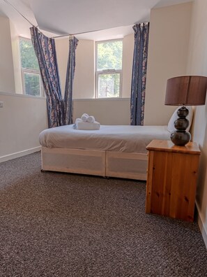 City Apartment, Multiple Beds, Non Smoking | Blackout drapes, iron/ironing board, free WiFi