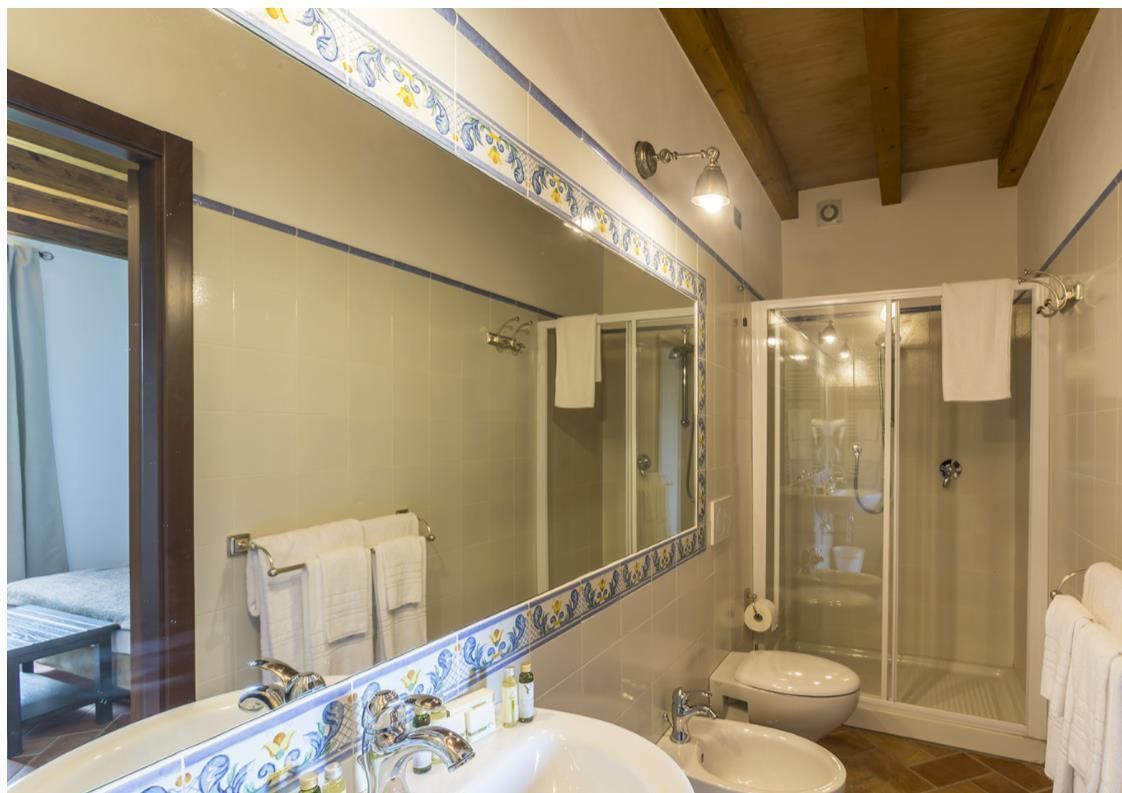 quadruple room | bathroom | shower, free toiletries, hair dryer, slippers