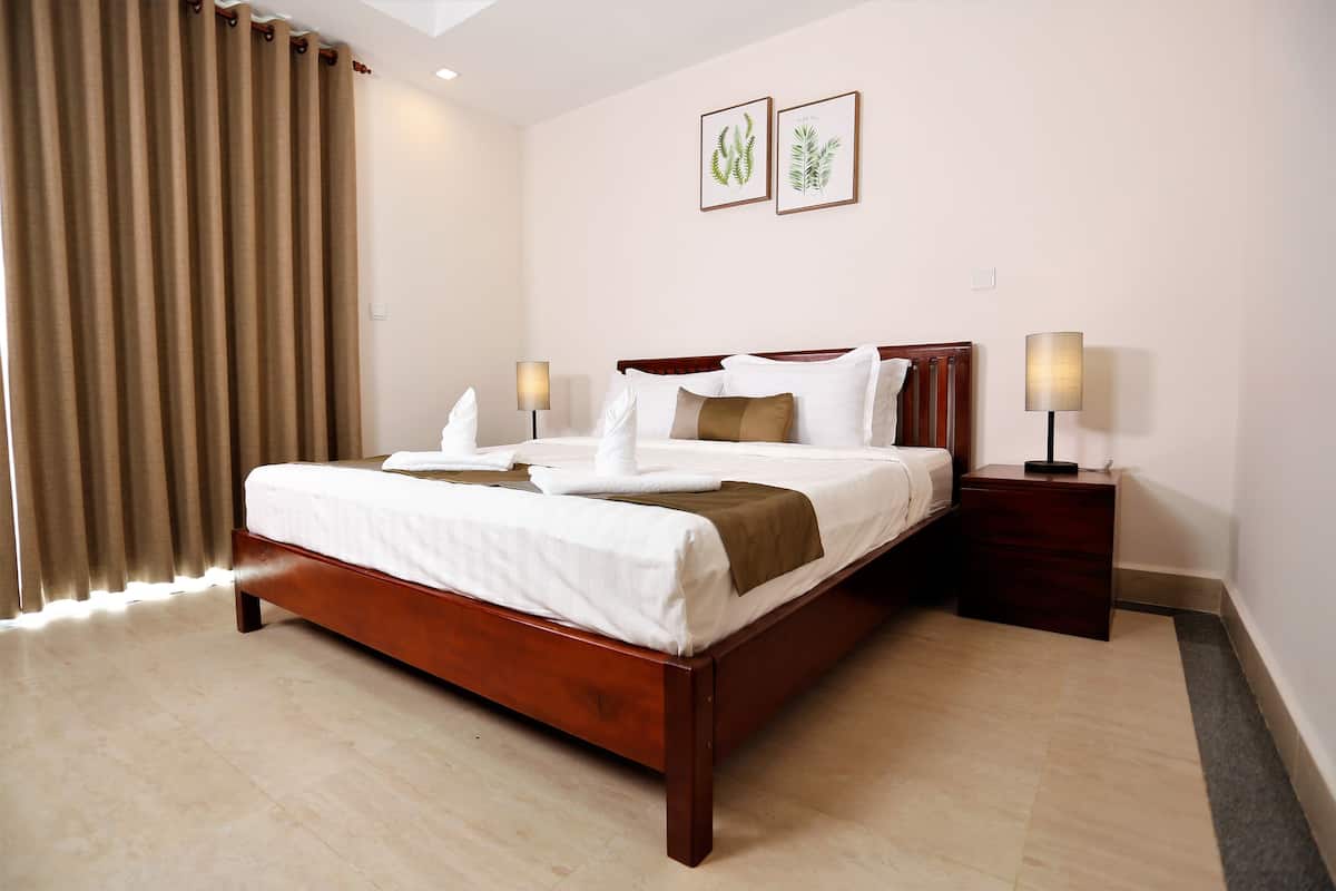 2 habitaciones, minibar y caja de seguridad en la habitación