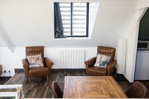 Suite (Grand Nord) | Área de sala de estar | Televisión de pantalla plana 