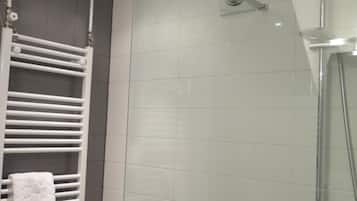 Shower, free toiletries, hair dryer, towels