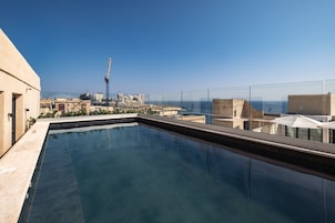 Seasonal outdoor pool, pool umbrellas, sun loungers
