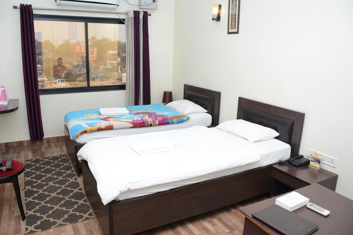 Habitación Deluxe con 1 cama matrimonial o 2 individuales, 1 habitación | 1 habitación