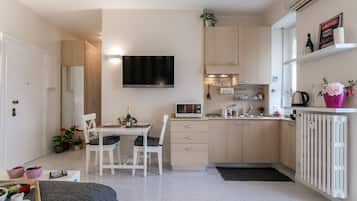 Studio | Living area | Flat-screen TV