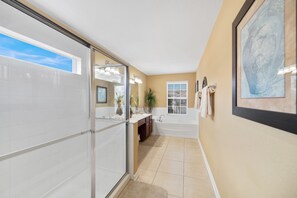 Bathtub, hair dryer, towels