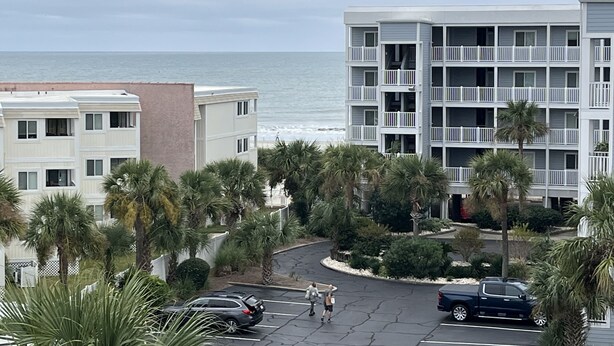 A multi-story hotel with balconies overlooking a beach. - Great View w/o Oceanfront Prices-3BR 2.5BA -  (Myrtle Beach)