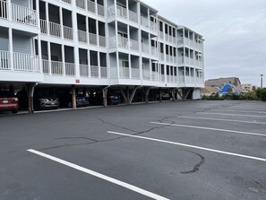 A multi-story parking garage with white railings and a flat roof. - Great View w/o Oceanfront Prices-3BR 2.5BA -  (Myrtle Beach)