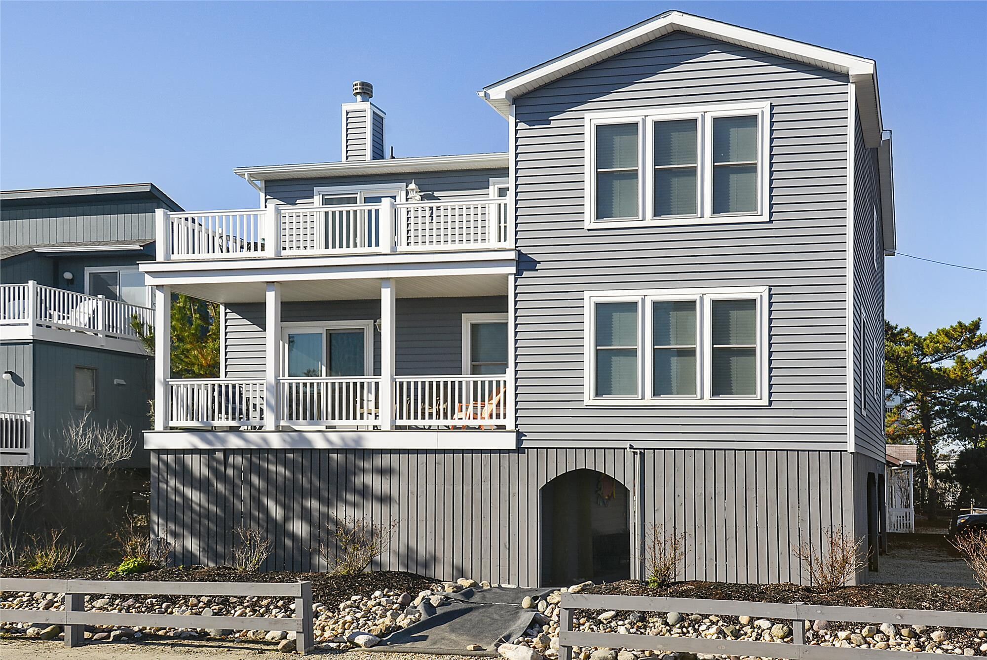 FREE DAILY ACTIVITIES & GREAT OCEAN VIEWS!! You will enjoy the ocean views and breezes from the double decks of this lovely 6 bedroom home consisting of six bedrooms , 4 full bathrooms, open concept style new home located just one house from the ocea