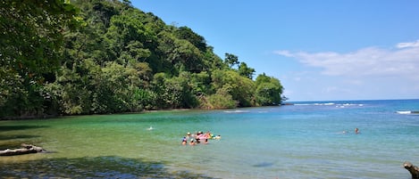 On the beach, sun-loungers, beach towels