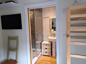 Bathtub, hair dryer, towels, soap