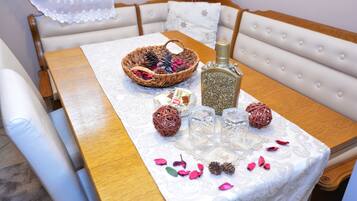 Apartment, 1 Bedroom, Sea View | 1 bedroom, in-room safe, desk, iron/ironing board