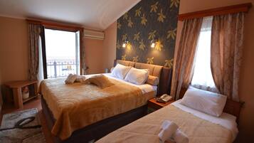 Apartment, 1 Bedroom, Terrace, Sea View | 1 bedroom, in-room safe, desk, iron/ironing board